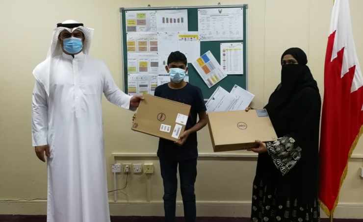 bahrain laptops students schools needy