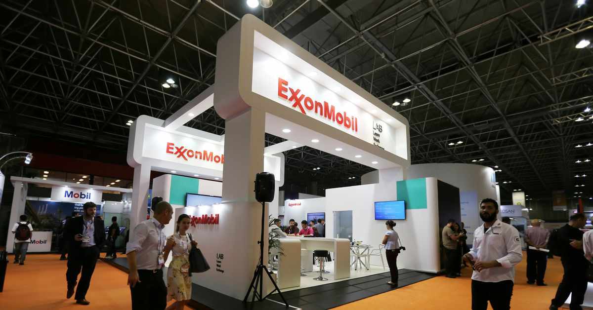 chairman,exxon,shareholders,woods,proxy