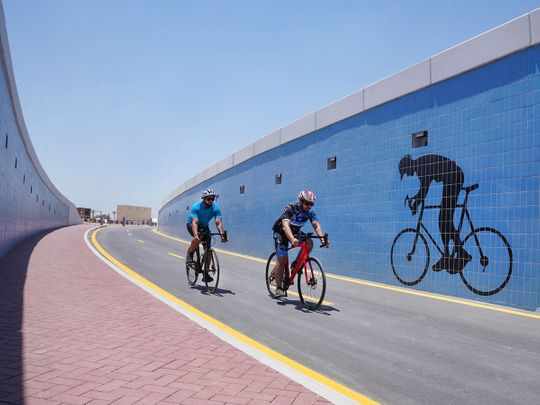 dubai,cycling,meydan,cyclists,tunnel