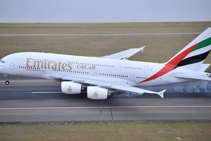 dubai,emirates,mid,flight,birth