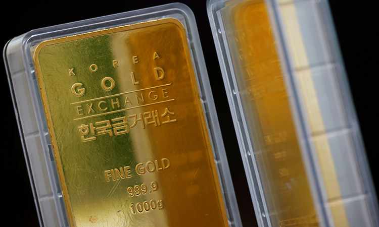 gold prices fed pledge dollar