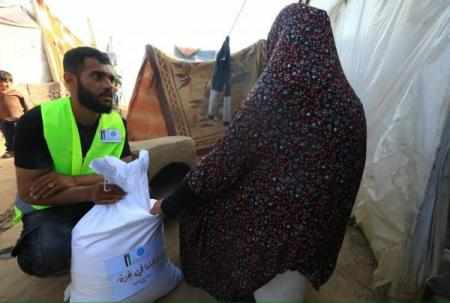 gaza,jhco,flour,ramadan,distributes