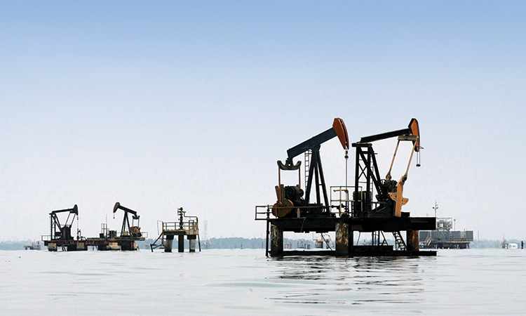 oil prices dollar gains stocks