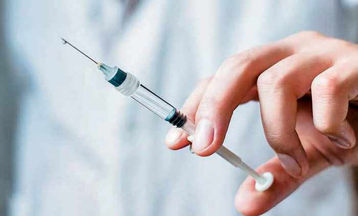 oman private hospitals covid vaccination