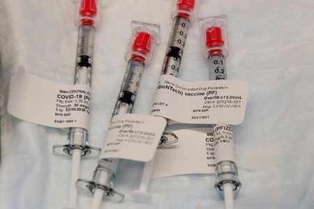 qatar oman pfizer biontech vaccine