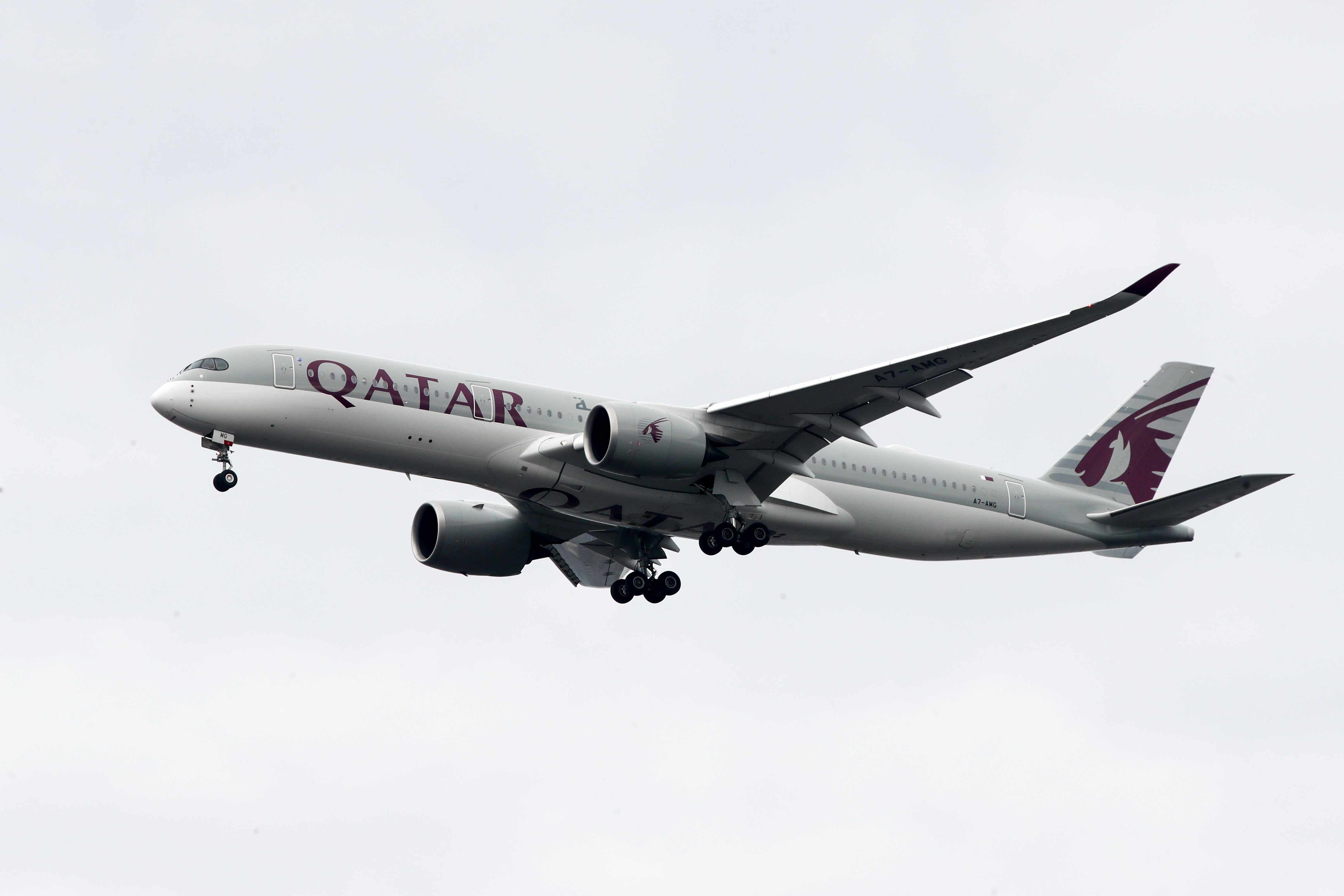 qatar women australia flights strip