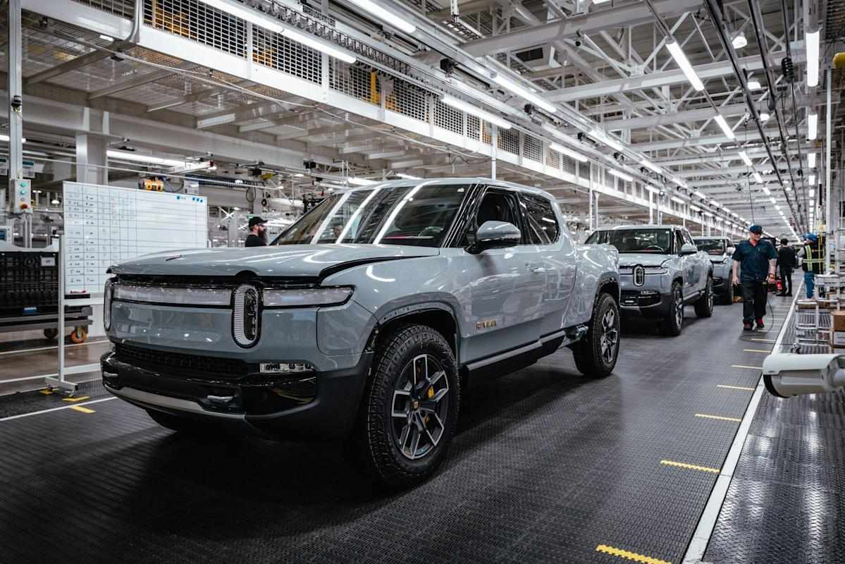 report,shares,rivian,amid,ford