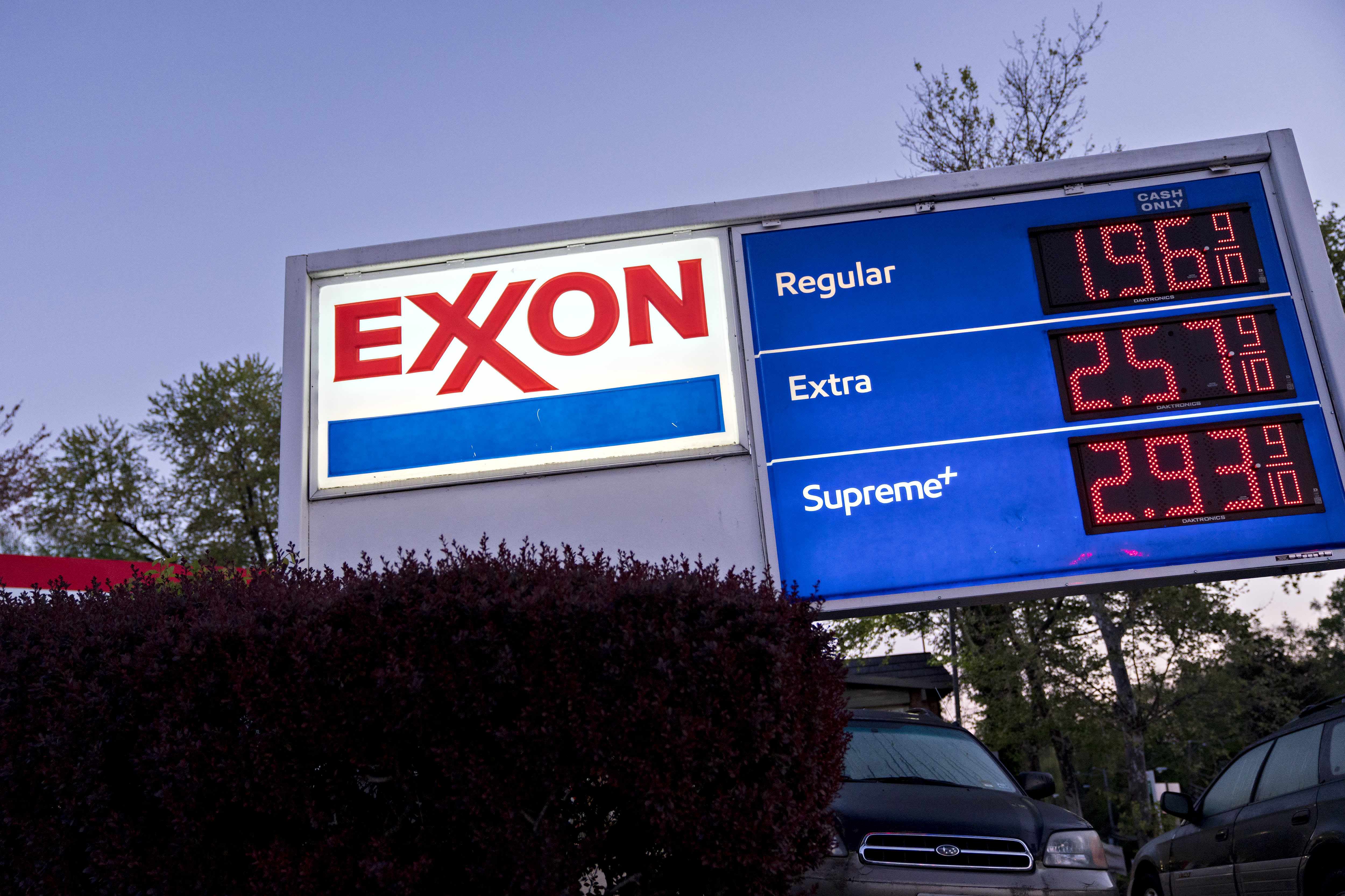 wall-street exxon analysts brutal market