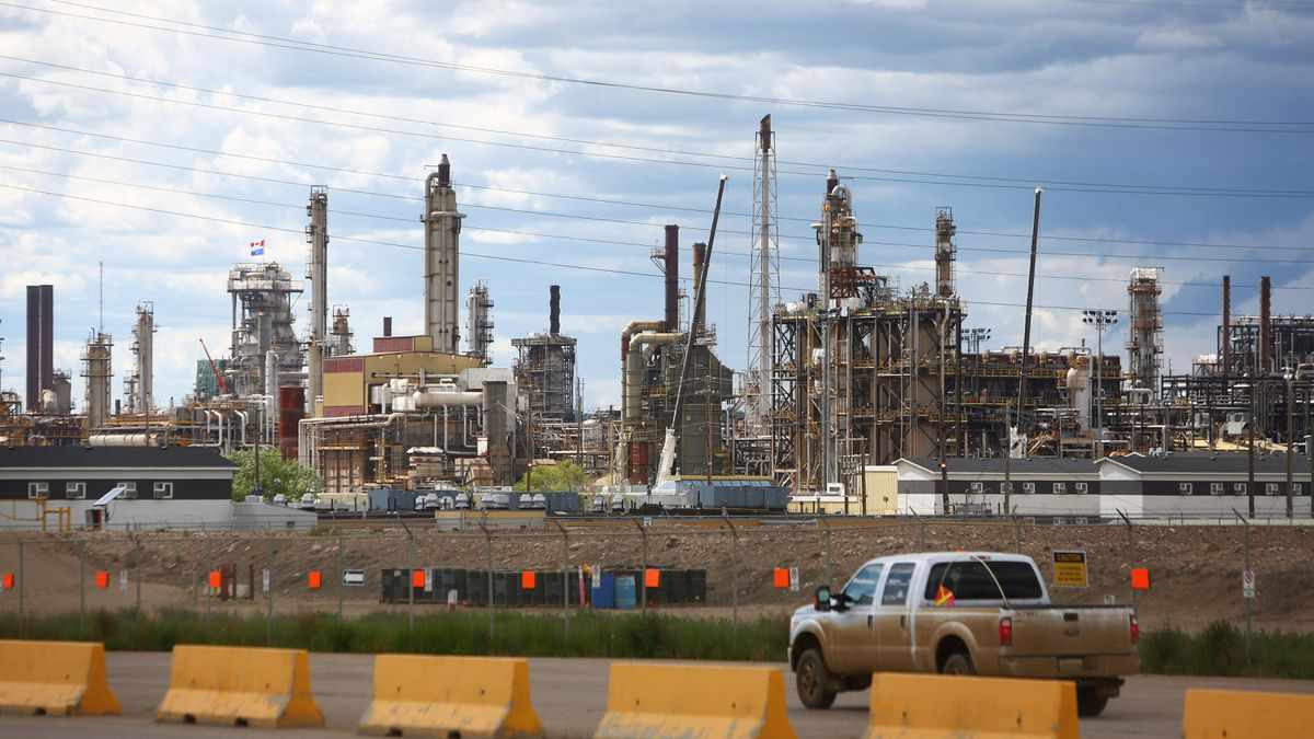 oil exxonmobil chevron record losses